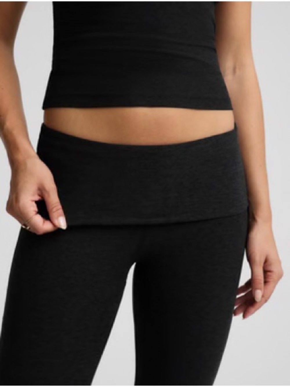 Beyond Yoga Fold-Over Waistband Flare Leggings in Black